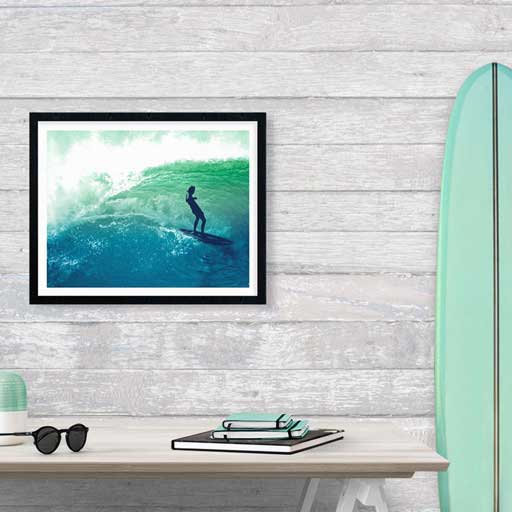 Surfer print framed and hanging over desk